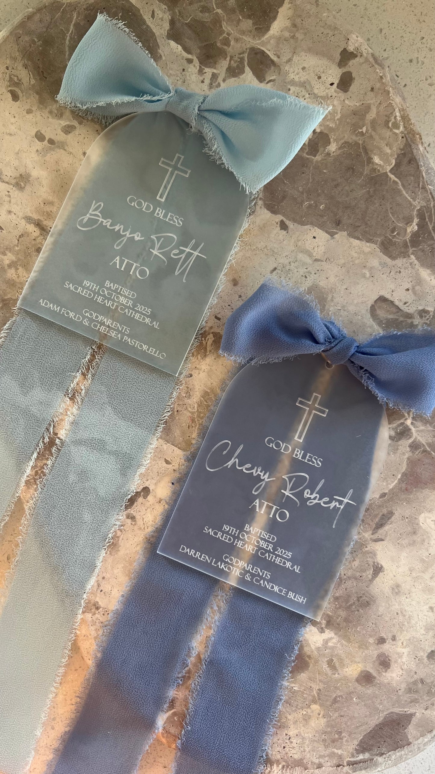 two frosted Christening Candle Tags with Blue Bows with engraved details