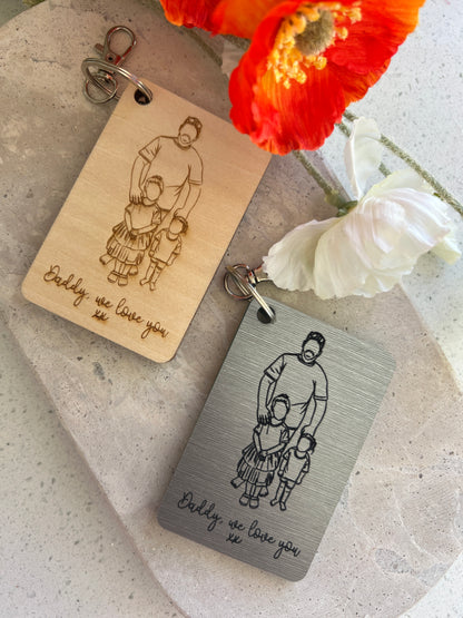 Two keychains - wood and stainless look with engraved designs personalised 