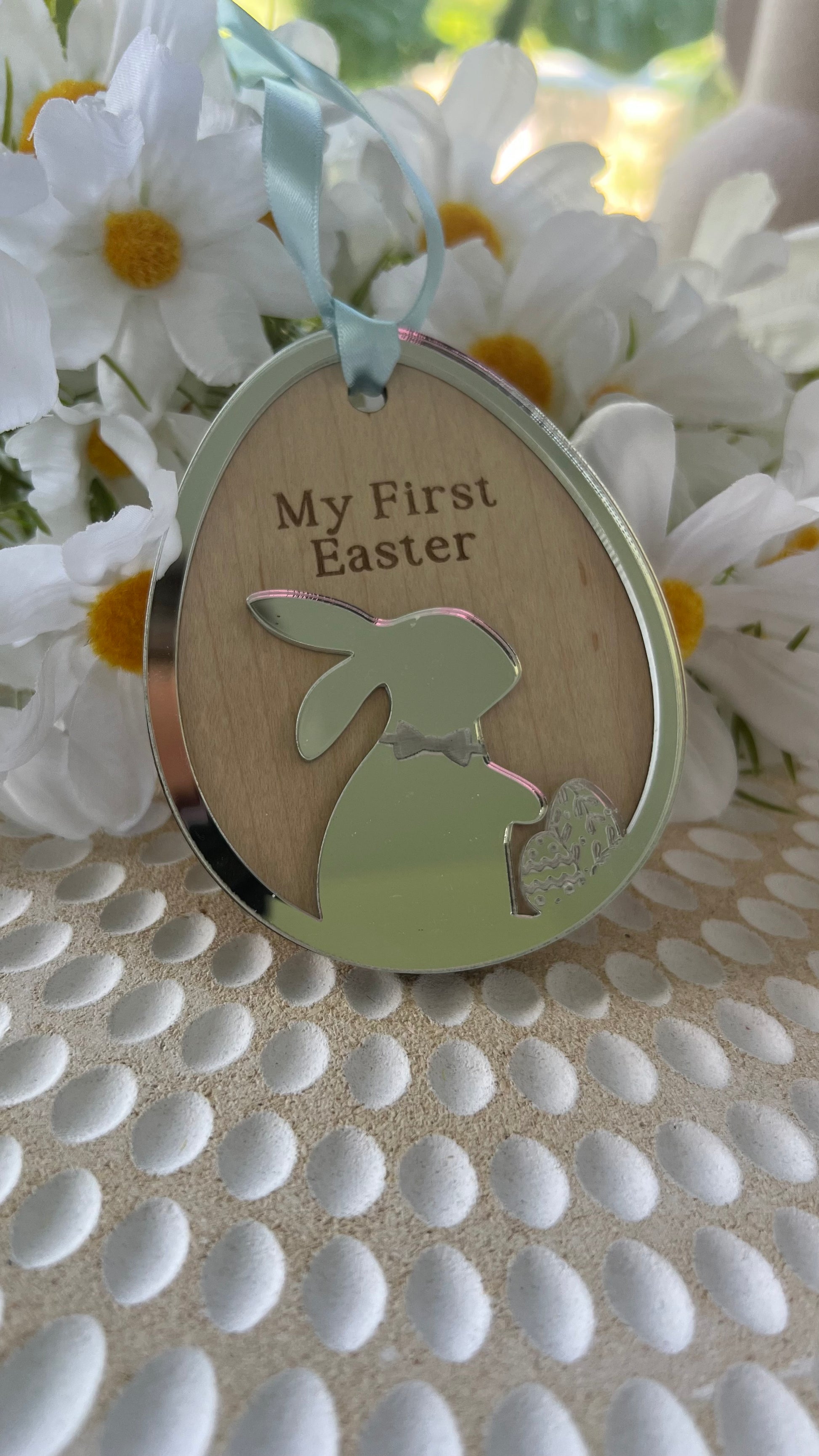 Personalized keepsake ornaments for Easter, featuring pastel colors mirror with ribbons, engraved with 'My First Easter' and customizable text.