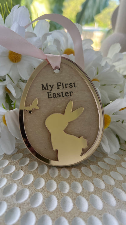Personalized keepsake ornaments for Easter, featuring pastel colors mirror with ribbons, engraved with 'My First Easter' and customizable text.