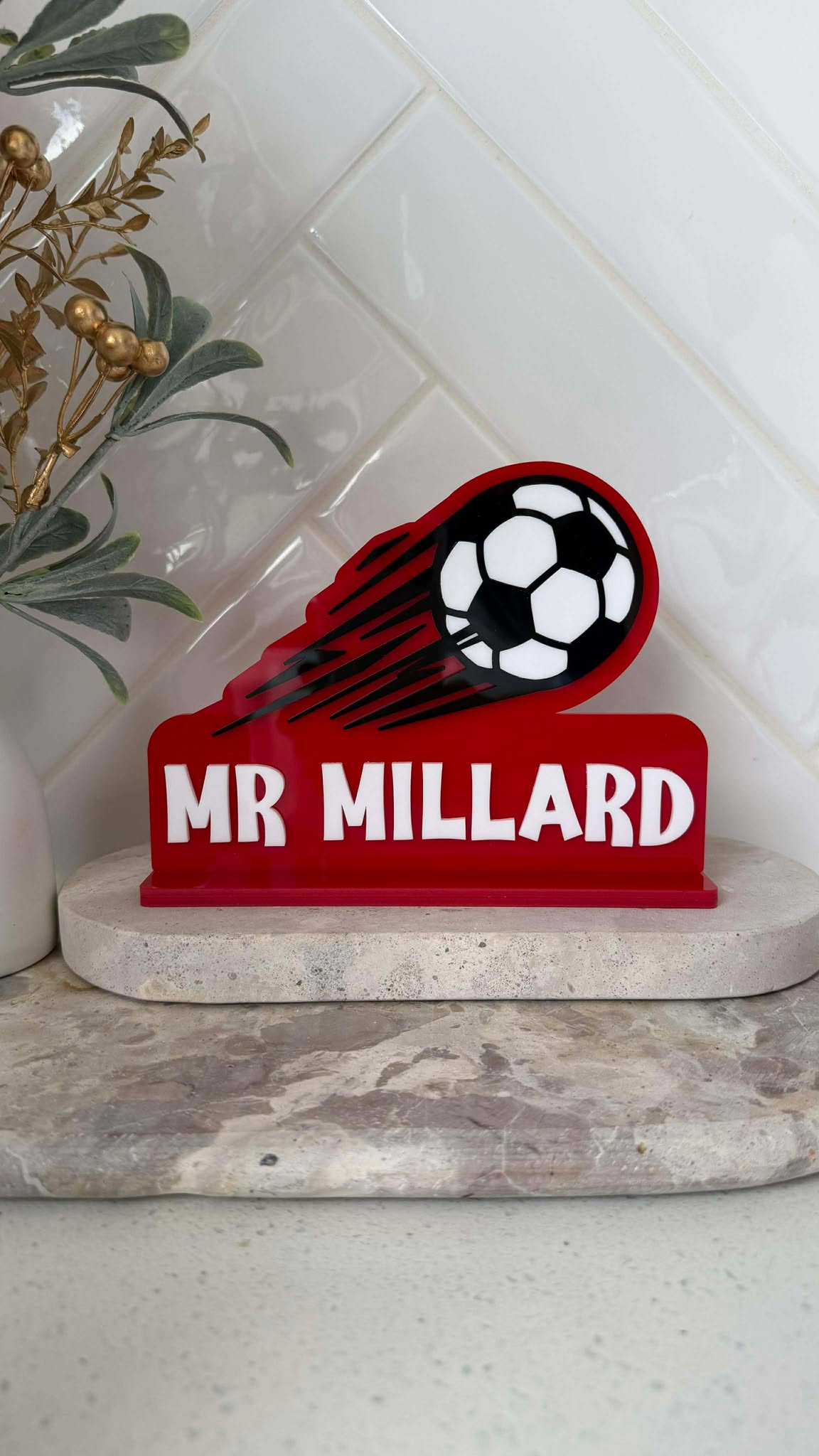 Red sign with soccer ball Decorative design for a teacher gift